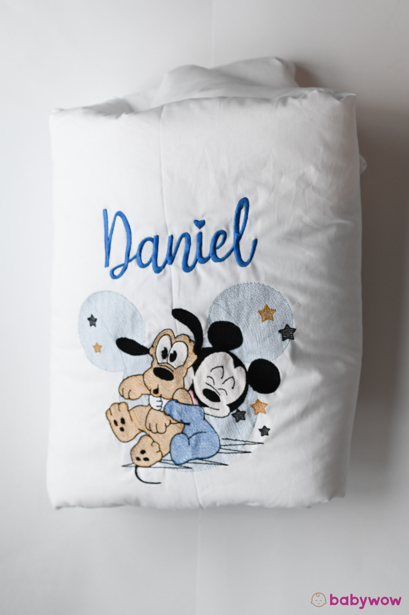White quilt Mickey and Pluto